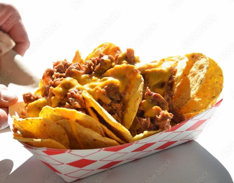 Guests lining up at a taco bar at a corporate event in the GTA