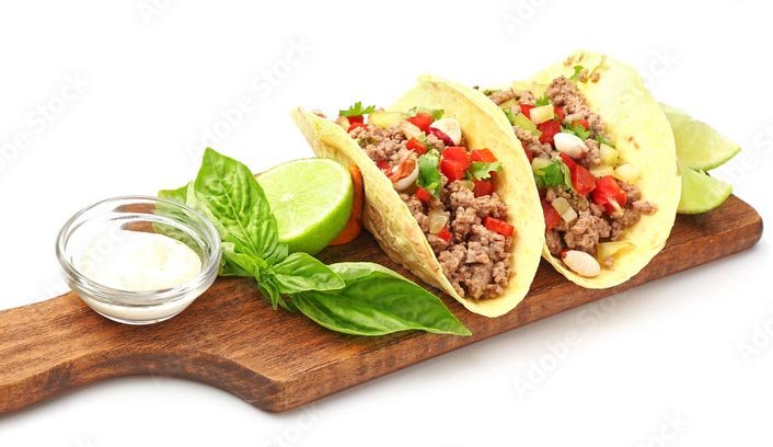 Taco catering station set up under canopy tents at a GTA event