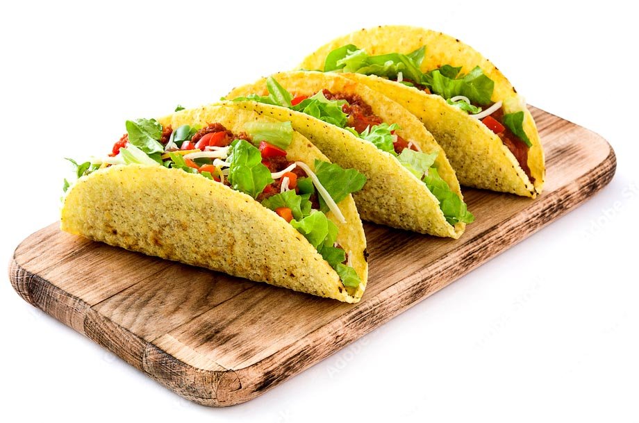 Taco toppings and salsa bar at a catered event